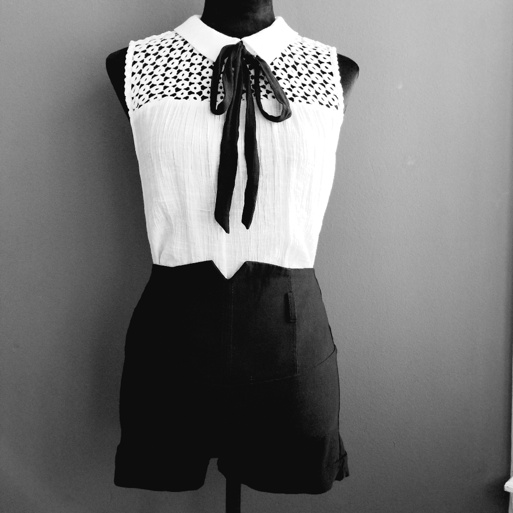 Lydelle White Sleeveless Blouse